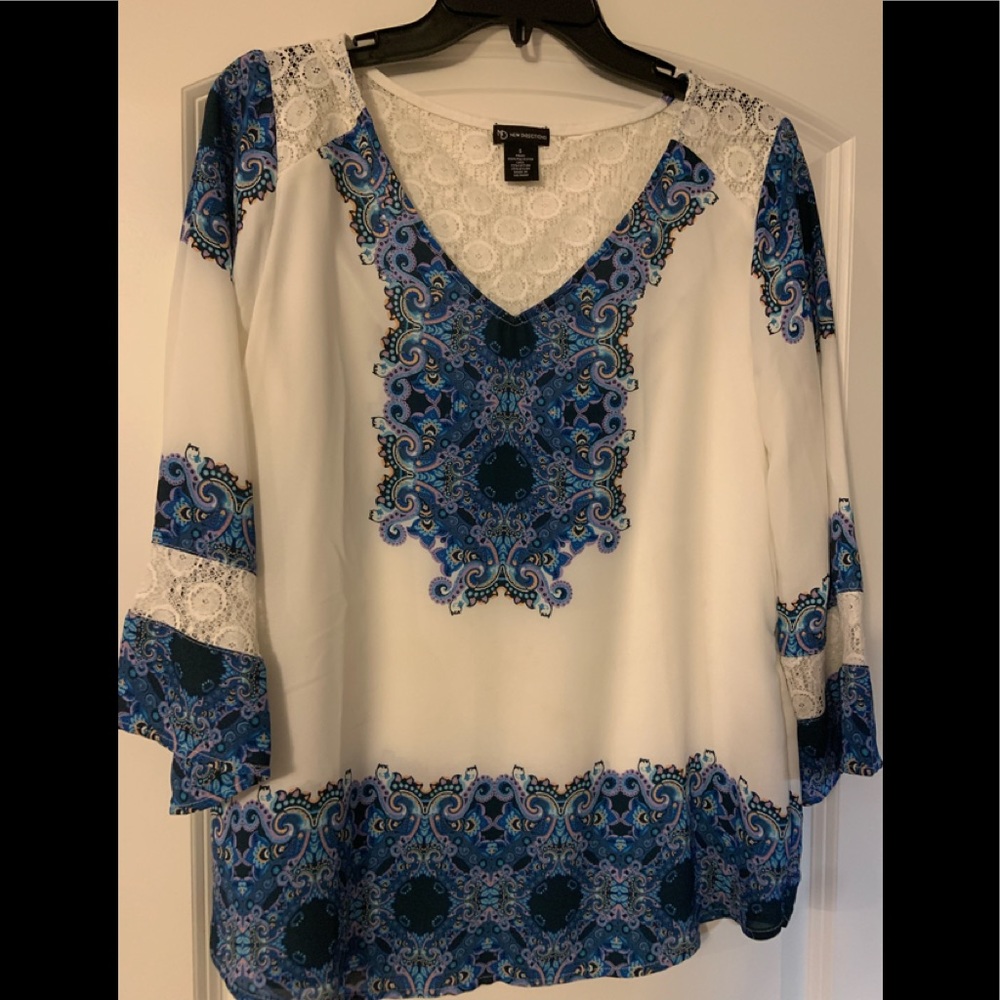 Ladies top with lacy back and inset on arms